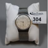 Skagen of Denmark steel gents wristwatch, the face with baton numerals, in original box with papers.