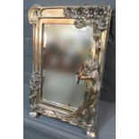 Art Nouveau design plated metal mirror or photograph frame with figural and floral decoration. 40