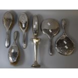 Box containing silver vanity set items, including; two hand mirrors and four brushes, together