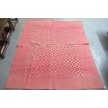 Red and cream early Welsh tapestry narrow loom blanket in checkered design. 211 x 176cm approx.