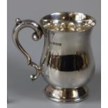 Small silver christening mug of baluster form, Birmingham 1958, 3.20 troy ozs approx. (B.P. 21% +