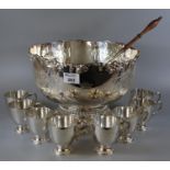 Sterling silver punch bowl set comprising punchbowl with ladle, and a set of eight cups, by