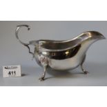 Silver sauce boat on moulded shell and hoof feet, Chester 1934, 7.44 troy ozs approx. (B.P. 21% +