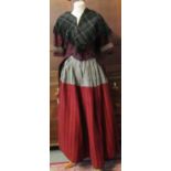 19th Century traditional woollen Welsh costume to include; a red and black striped petticoat skirt