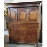 Early 19th Century Welsh oak Deuddarn having moulded cornice with drop finials above three ogee