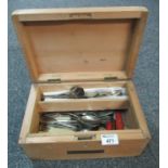 Old pine box with plaque reading D. Evan and containing an assortment of cutlery. (B.P. 21% + VAT)