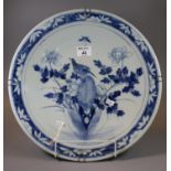 Chinese porcelain blue and white decorated charger having bird on a rock to the central field with a