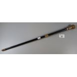 Early 20th Century presentation baton with ebonised shaft and gilded collars, presented as a token