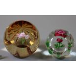 Caithness Scotland Q.J celebration Royal Mint floral paperweight, together with another floral thumb
