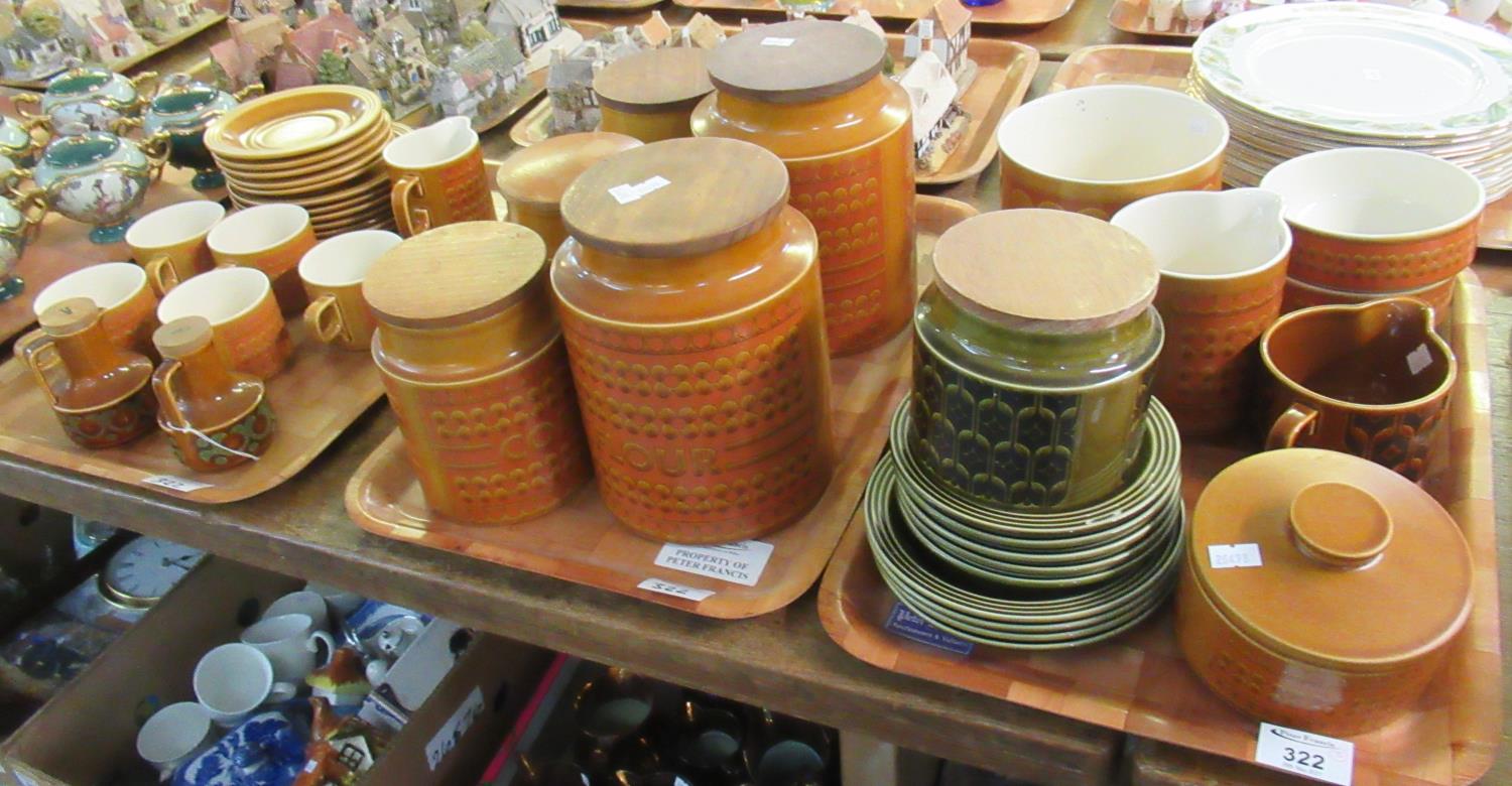 Three trays of Hornsea 'Saffron' pottery items to include; cups and saucers, utensil jars, jugs,