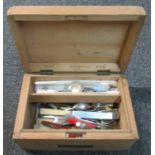 Old pine box with plaque reading D. Evan and containing an assortment of cutlery. (B.P. 21% + VAT)