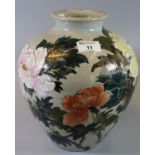 Oriental design stoneware baluster form vase decorated with flowers and foliage. (B.P. 21% + VAT)