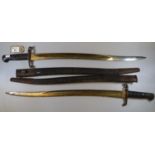 British 1856-58 pattern Enfield Yataghan sword bayonet with scabbard, together with another similar.