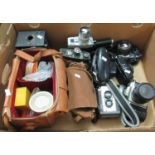Box of assorted vintage cameras and accessories to include; Nikon F60, argoflex Seventy five,