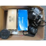 Box of vintage cameras and accessories to include; a leather cased Nikon Nikkor, a Nikon digital