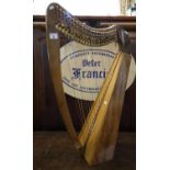 Modern Welsh miniature harp in walnut, pine and fruit wood. 84cm high approx. (B.P. 21% + VAT)