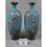 Pair of Japanese cloisonne turquoise ground baluster shaped vases with floral decoration, 18.5cm