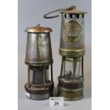 Two vintage minors lamps, one marked Hailwoods, the other The Wolf Safety Lamp co. Ltd.