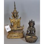 A group of two yellow metal seated figures to include; Thai Shakyamuni Buddha and Maitreya