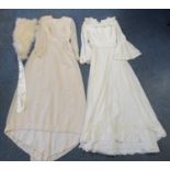 Two high necked 1970's wedding dresses, one with crochet detail, one with lace, together with an