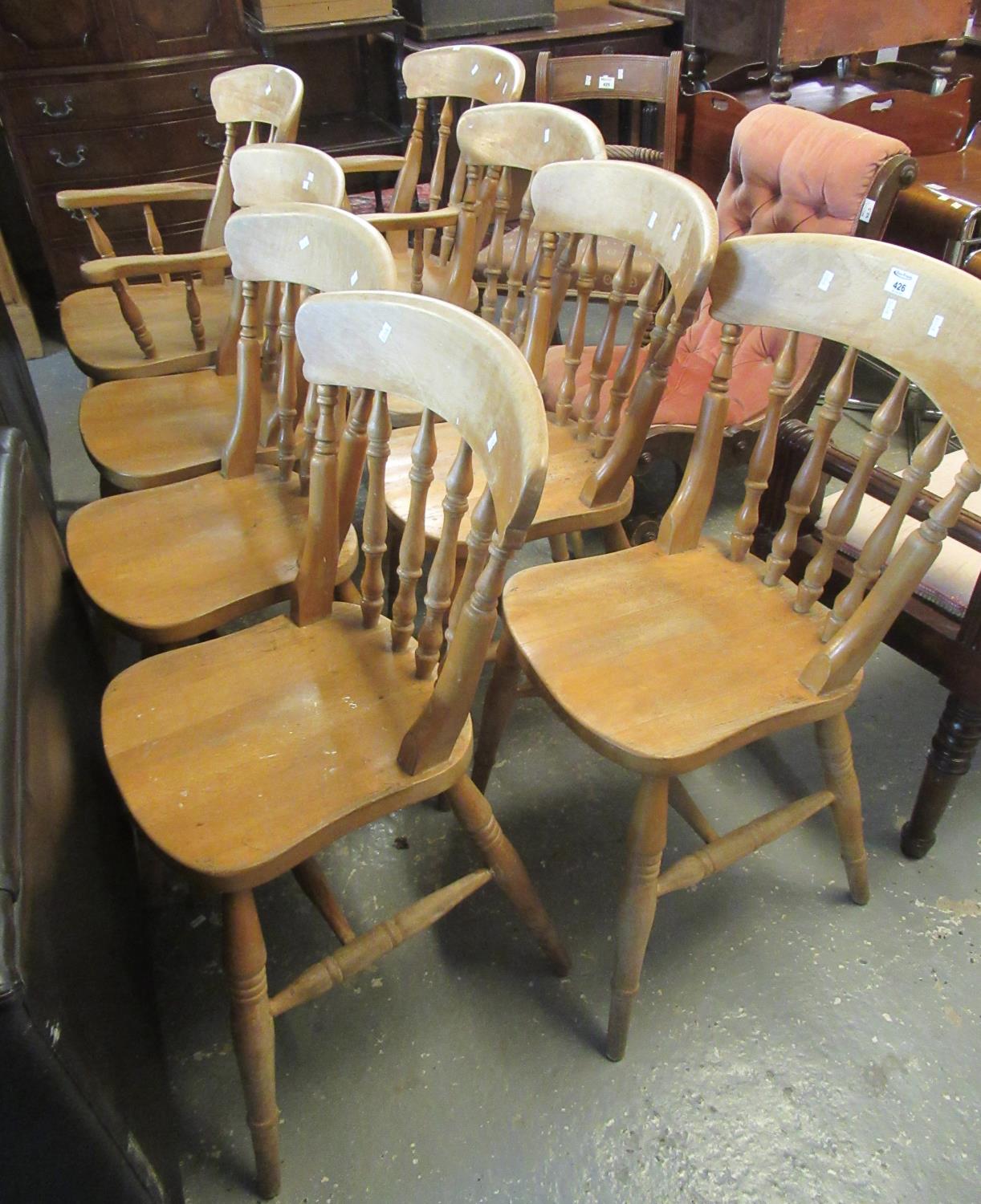 A set of eight beech spindle back kitchen chairs (6+2) (8)