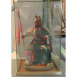 Probably Chinese seated ceramic figure of Guan Yu holding his halberd in glass case. Modern. (B.P.