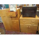Mid Century G-Plan oak bedroom suite comprising tallboy, chest and mirror back dressing table.