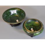 Two similar Chinese cloisonne green ground floral and foliate censers or bowls on hardwood