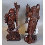 Two decorative 'root' style wood carvings of Shou Lao leaning on his staff, together with General