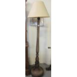 20th Century mahogany standard lamp with shade on fluted and circular moulded base. (B.P. 21% + VAT)