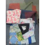 Four vintage quilts; two plain with different colours to the other side, a floral design and a