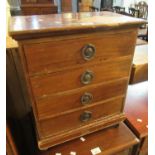 Small distressed mahogany table top straight front chest or collectors cabinet of four drawers on