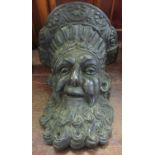 Carved oak mask head wall shelf of Neptune. (B.P. 21% + VAT)