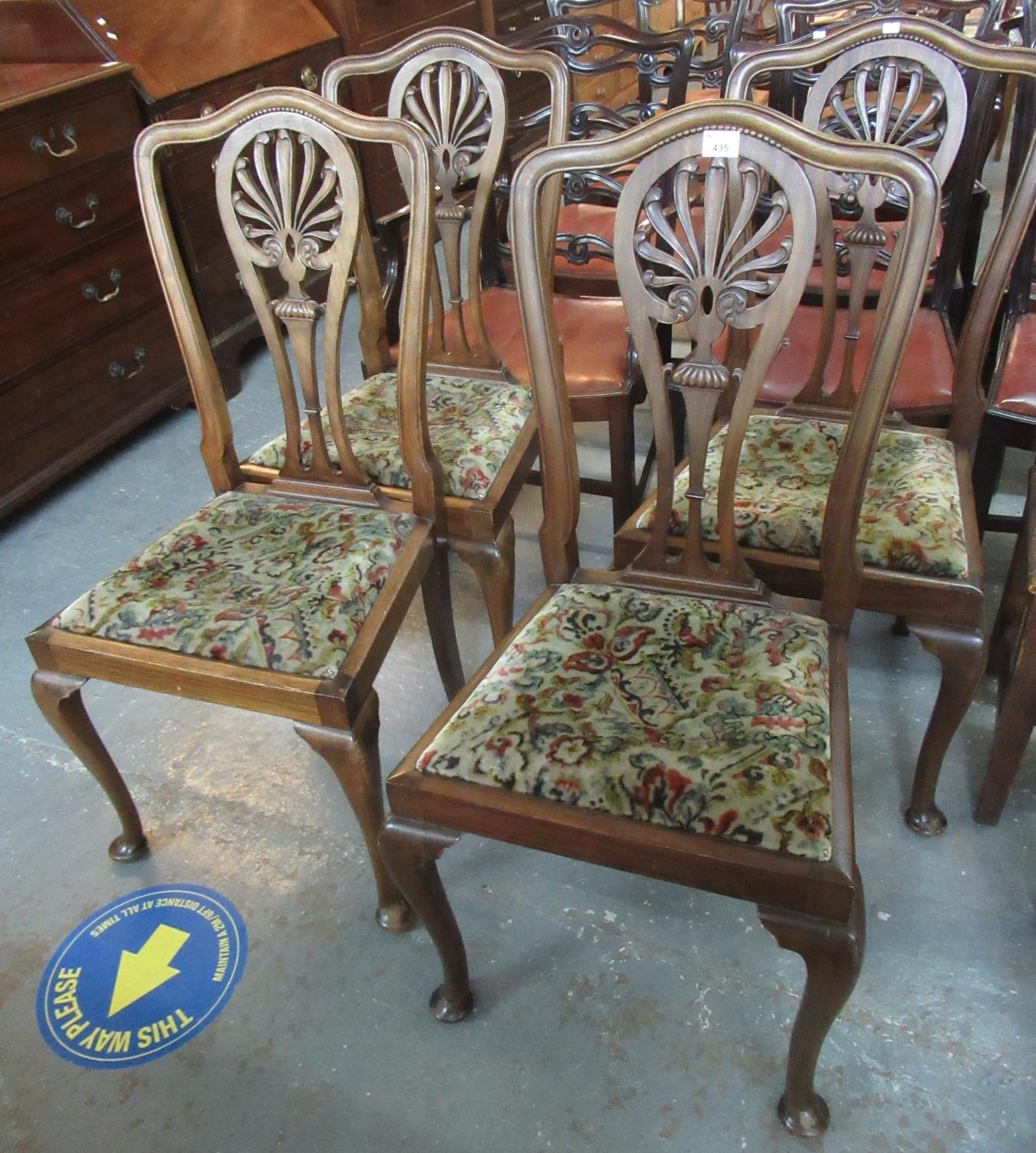 Set of four 20th Century mahogany cabriole leg dining chairs with drop in seats on pad feet. (4) (