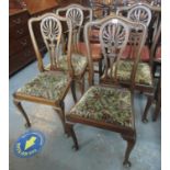 Set of four 20th Century mahogany cabriole leg dining chairs with drop in seats on pad feet. (4) (