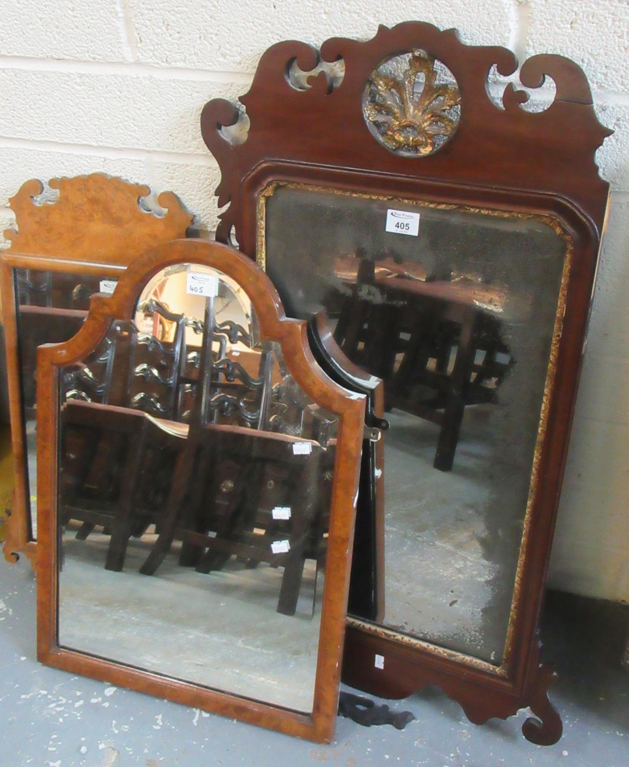 Two 19th Century fret cut mirrors, one with walnut frame, the other mahogany with distressed