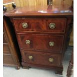 Good quality reproduction flame mahogany chest of three drawers of narrow and small proportions on
