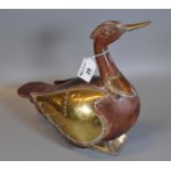 A hand carved wooden duck on stand with overlaid brass and copper decoration, probably Indian. (B.P.