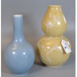 Chinese porcelain double gourd vase with white slip decoration on a yellow ground, together with