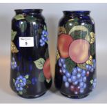 Pair of Royal Stanley ware grape and vine pattern vases. (2) (B.P. 21% + VAT)