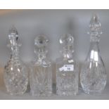 Four cut glass decanters with stoppers of mallet and square form. (4) (B.P. 21% + VAT)