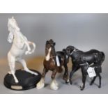 Royal Doulton 'Spirit of the Wild' rearing white horse on wooden circular base. Together with