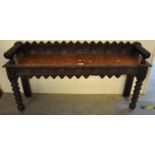 Late Victorian heavily carved oak window or hall seat. (B.P. 21% + VAT)