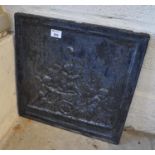 18th Century cast iron fire back with moulded cherub decoration. (B.P. 21% + VAT)