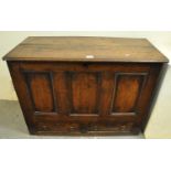 18th Century Welsh oak coffer of small proportions with three fielded panels above two fitted