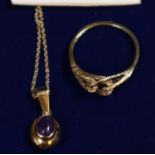 18ct gold amethyst pendant on a 9ct gold chain together with a 9ct gold ring. Ring size Q. Approx
