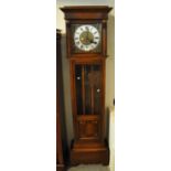 Mid Century oak three train longcase clock with silver dial and Roman numerals with key and