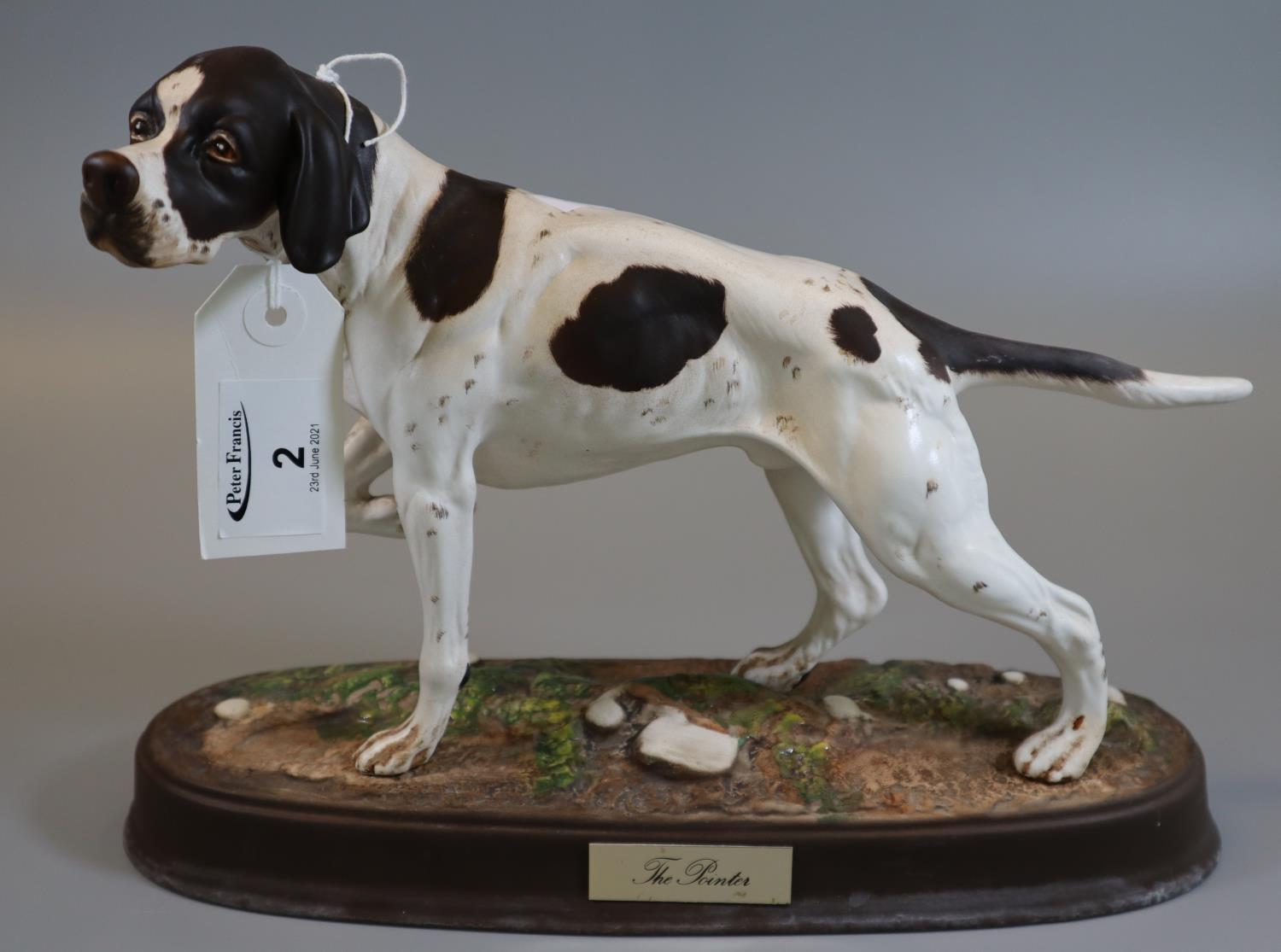 Royal Doulton 'The Pointer' figurine of a dog on oval naturalistic base with plaque and black