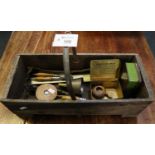 Vintage wooden trug with assorted items to include; rulers, nutcracker, corkscrew, vintage tins etc.