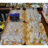 Four trays of assorted glassware including: Waterford crystal, thumb and slice cut drinking glasses